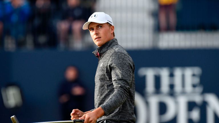 US golfer Jordan Spieth reacts to making a putt on the 18th green during his third round on day three of the Open Golf Championship at Royal Birkdale 