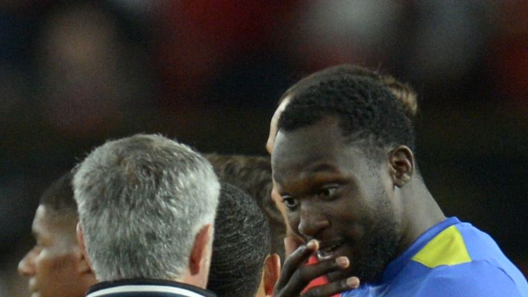 Manchester United's Portuguese manager Jose Mourinho (L) talks with Everton's Belgian striker Romelu Lukaku (R) at the end of the friendly Wayne Rooney tes