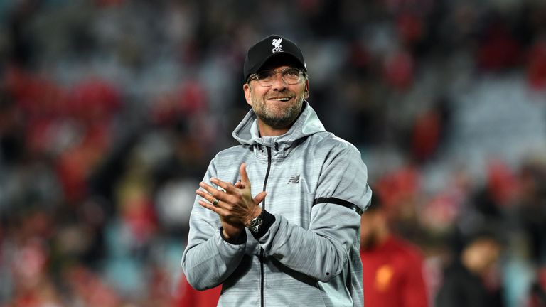 Liverpool coach Jurgen Klopp applauds the fans after their end-of-season friendly football match against Sydney FC