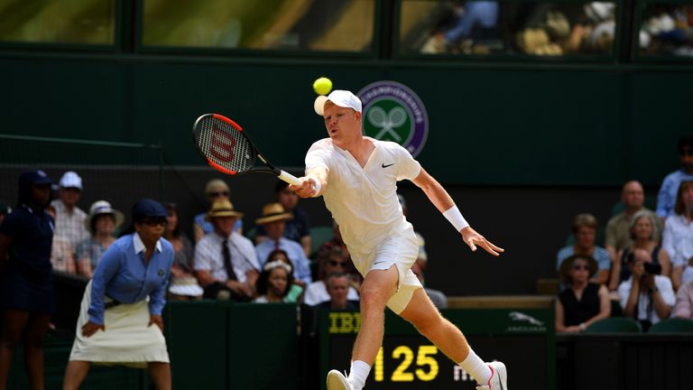 Kyle Edmund reaches for a forehand in the first set of his tie with Gael Monfils