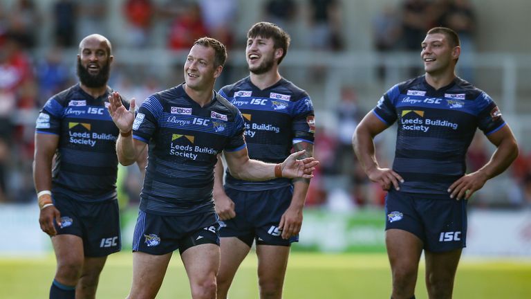 Danny McGuire of Leeds Rhinos celebrates with team mates at the final whistle