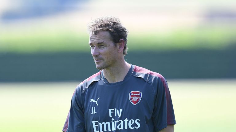 First- team coach Jens Lehmann oversees a training session at London Colney