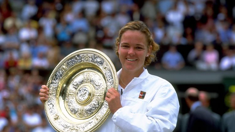 4 Jul 1999:  Lindsay Davenport of the United States proudly lifts the trophy after winning the Wimbledon Ladies Singles Championship Final match