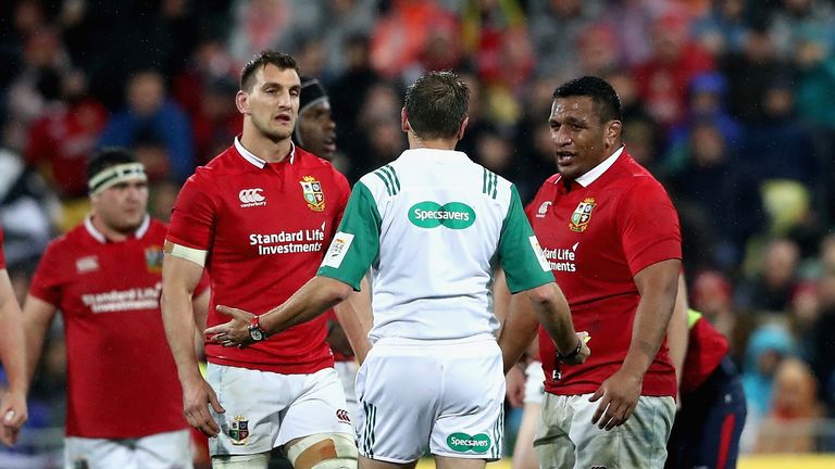 WELLINGTON, NEW ZEALAND - JULY 01:  Jerome Garces, the referee, talks to Lions prop Mako Vunipola (R) and Lions captain Sam Warburton during the match betw