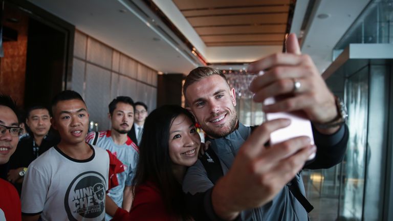 HONG KONG, HONG KONG - JULY 17: Liverpool FC's Jordan Henderson stops for a selfie with fans in Hong Kong on July 17, 2017 in Hong Kong.