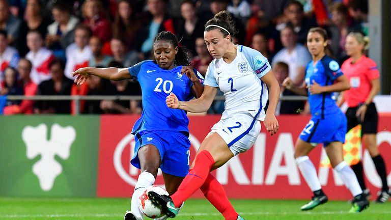 France's forward Kadidiatou Diani (L) vies with England defender Lucy Bronze