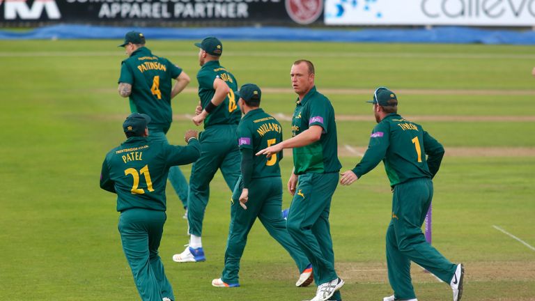Luke Fletcher of Nottinghamshire Outlaws is congratulated by team mates after taking the wicket of Steve Davies of Somerset