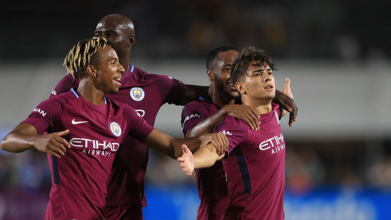 LOS ANGELES, CA - JULY 26:  Demeaco Duhaney #81, Eliaquim Mangala #15 and Raheem Sterling #7 congratulate Brahim Diaz #55 of Manchester City after he score