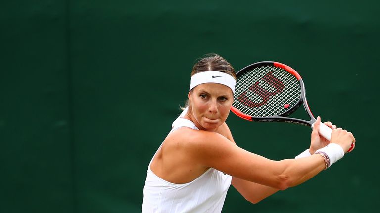 Mandy Minella in action during her first round singles match against Francesca Schiavone
