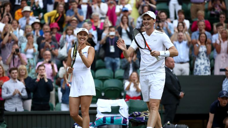  Jamie Murray of Great Britain and Martina Hingis of Switzerland celebrate victory after their Mixed Doubles semi final 