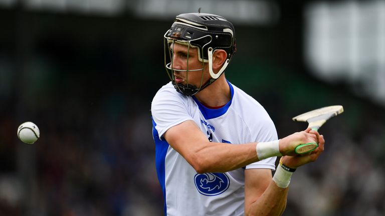 Maurice Shanahan of Waterford scores a point during the GAA Hurling All-Ireland Senior Championship Round 1 match between Offaly and Waterford