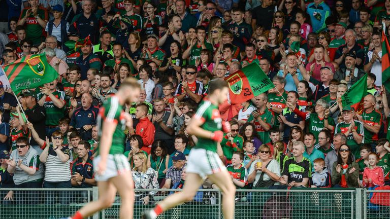 Mayo supporters encourage their side at the half-time break during the GAA Football All-Ireland Senior Championship Round 4A match between Cork and Mayo