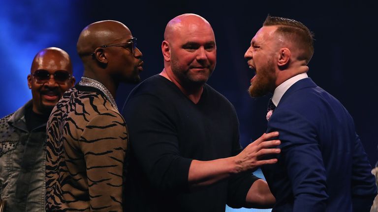  Dana White splits Floyd Mayweather Jr. and Conor McGregor apart during the Floyd Mayweather Jr. v Conor McGregor World Press To