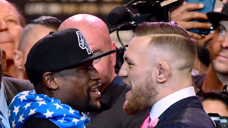 LOS ANGELES, CA - JULY 11:  Floyd Mayweather Jr. and Conor McGregor stand face to face during the Floyd Mayweather Jr. v Conor McGregor World Press Tour at