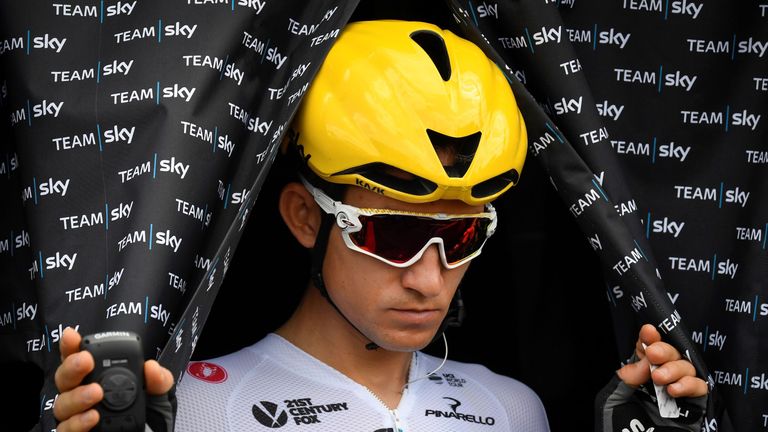 Poland's Michal Kwiatkowski leaves the bus of the Great Britain's Sky cycling team