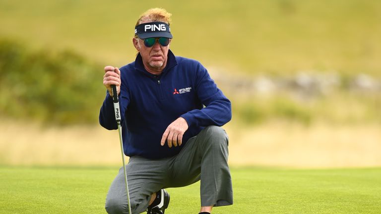 BRIDGEND, WALES - JULY 27:  Miguel Angel Jimenez of Spain lines up a putt on the 5th green during the first round of the the Senior Open Championship prese