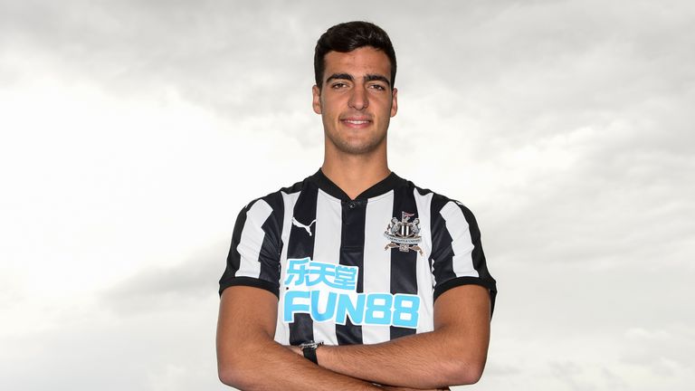 New signing Mikel Merino poses for photographs at the Newcastle United Training Centre