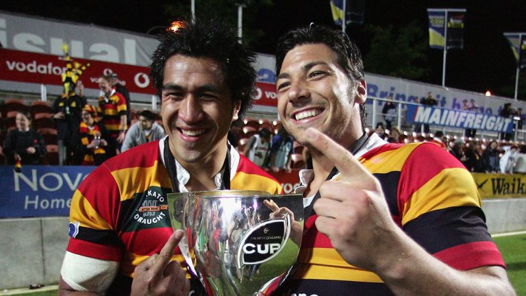 HAMILTON, NEW ZEALAND - OCTOBER 21:  Mils Muliaina (L) and Byron Kelleher of Waikato hold the trophy following their teams win in the Air New Zealand Cup F