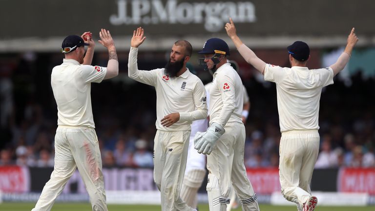England's Moeen Ali (second left) celebrates taking the wicket of South Africa's Theunis de Bruyn during day four of the First Investec Test