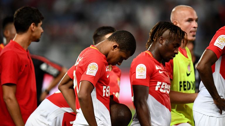 Monaco's French forward Kylian Mbappe (C) reacts after losing the French Trophy of Champions (Trophee des Champions) football match between Monaco (ASM) an