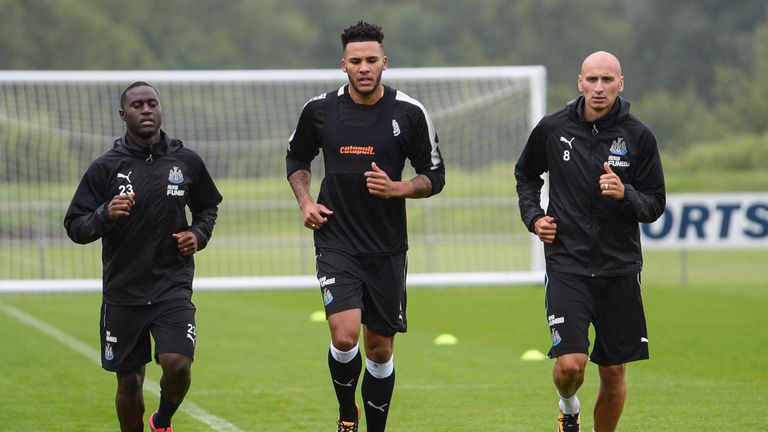NEWCASTLE, ENGLAND -  JULY 5: Newcastle players seen L-R Henri Saivet, Jamaal Lascelles and Jonjo Shelvey jog around the pitchduring the Newcastle United T