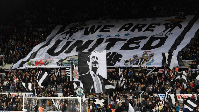 Newcastle United fans show off their flags and banners before the Sky Bet Championship match v Leeds United at St James' Park, 14 April 2017