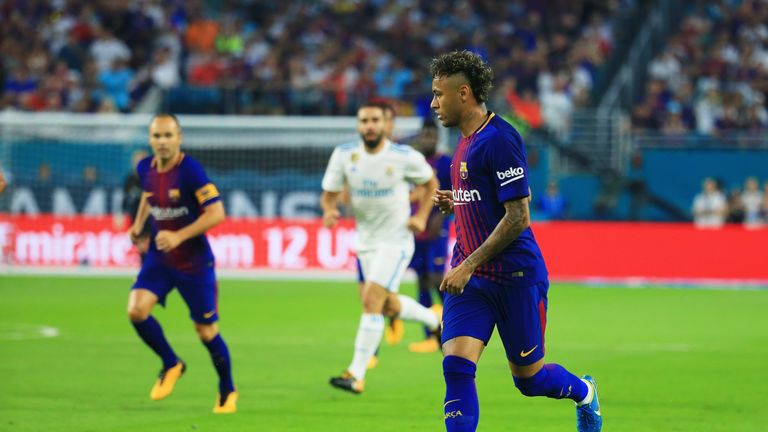 MIAMI GARDENS, FL - JULY 29:  Neymar #11 of Barcelona controls the ball against Real Madrid in the first half during their International Champions Cup 2017