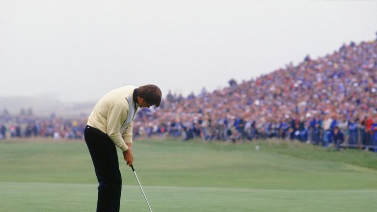 Faldo holes the winning putt for his first Major success