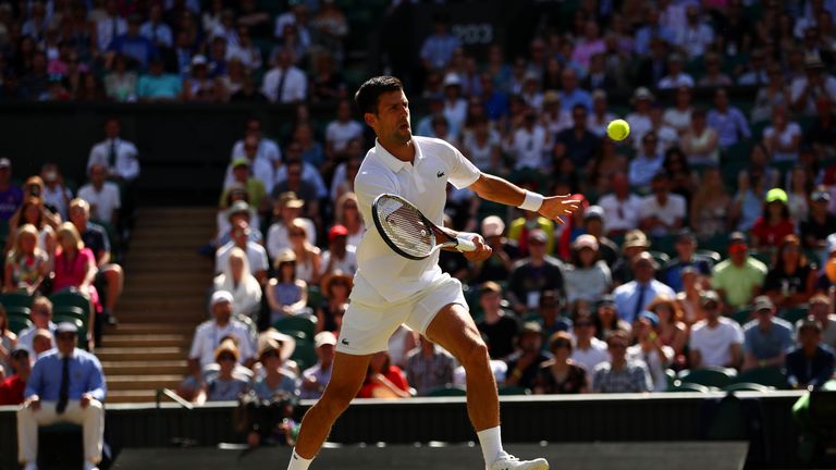 LONDON, ENGLAND - JULY 08:  Novak Djokovic of Serbia plays a forehand during the Gentlemen's Singles third round match against Ernests Gulbis of Latvia on 