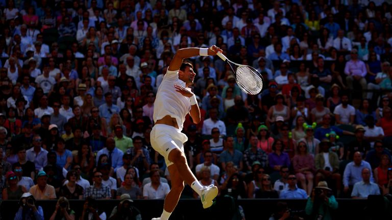 LONDON, ENGLAND - JULY 08:  Novak Djokovic of Serbia volleys during the Gentlemen's Singles third round match against Ernests Gulbis of Latvia on day six o