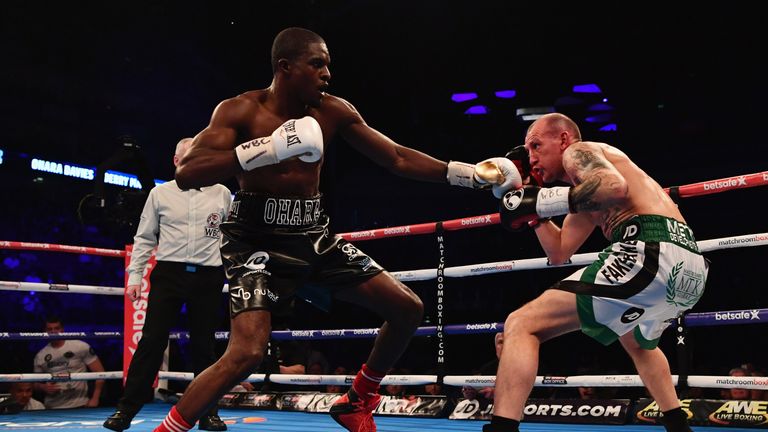 LONDON, ENGLAND - MARCH 04:  Ohara Davies (black trunks) and Derry Mathews (white trunks) in action during their WBC Silver Super Lightweight title contest