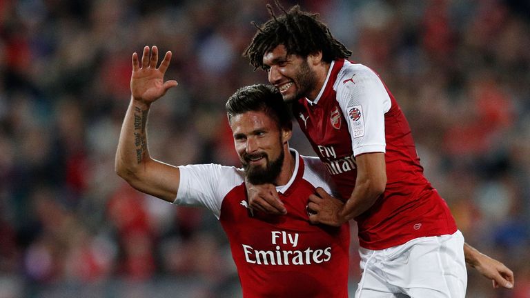 Olivier Giroud and Mohamed Elneny celebrate Arsenal's opening goal against Western Sydney Wanderers