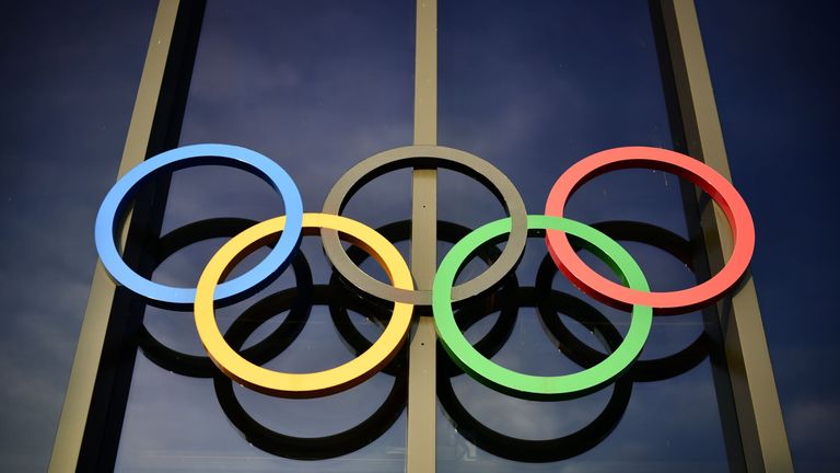 The Olympic rings are seen above the entrance on the facade of the Olympic Museum in Lausanne, Switzerland