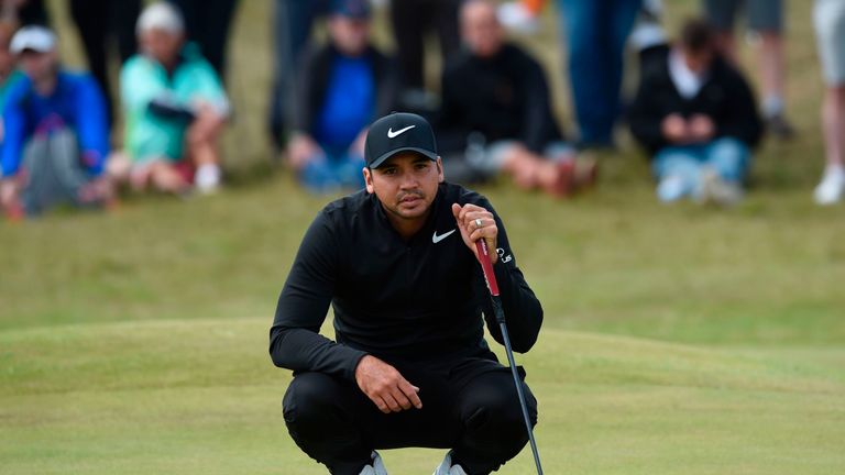Australia's Jason Day waits to putt on the 7th green during his opening round on the first day of the Open Golf Championship at Royal Birkdale golf course 