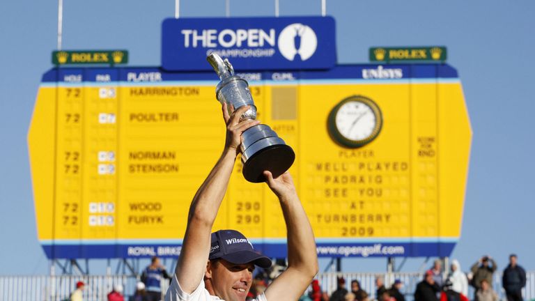 Padraig Harrington of Ireland poses with the Claret Jug after winning The Open golf tournament at Royal Birkdale in Southport in north-west England, on Jul