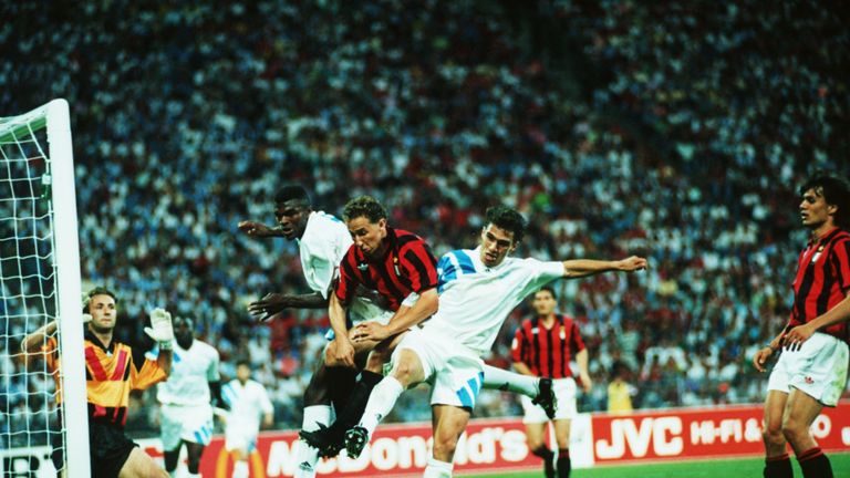 May 1993:  Jean-Pierre Papin of Milan is challenged by marcel Desailly and Jean-Christophe Thomas of Marseille during the European Cup Final played between