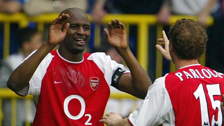 LONDON, UNITED KINGDOM:  Arsenal's French captain Patrick Vieira (L) celebrates his goal against Tottenham with teammate Ray Parlour (R) during their Premi