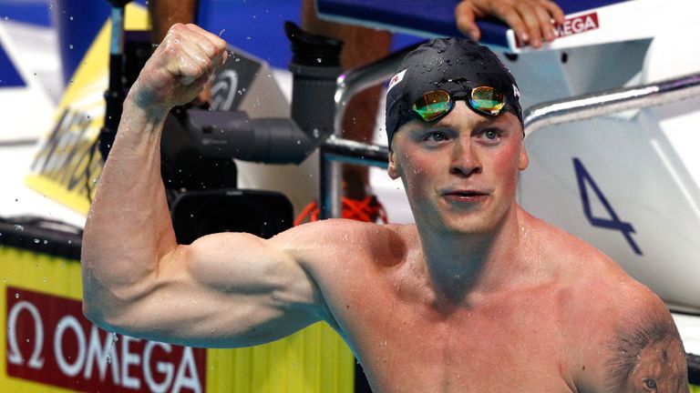 Adam Peaty celebrates after winning the gold medal in the Men's 50m Breaststroke final