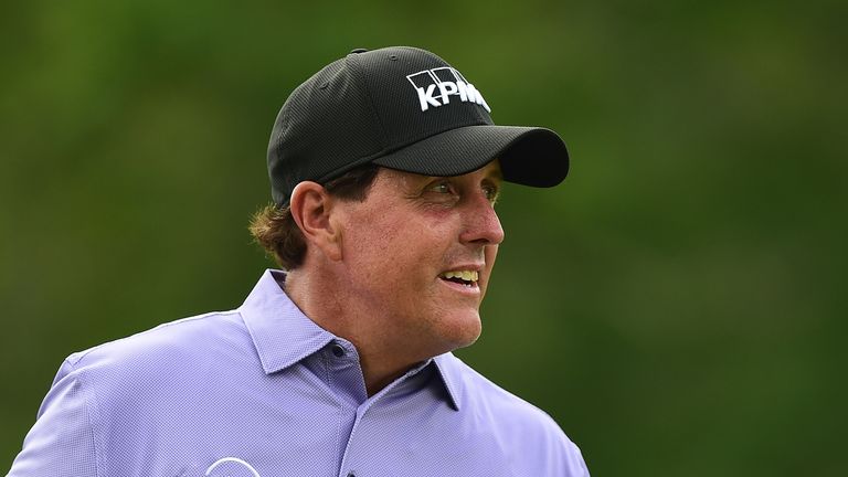 Phil Mickelson, and Ernie Els, celebrate 100 majors