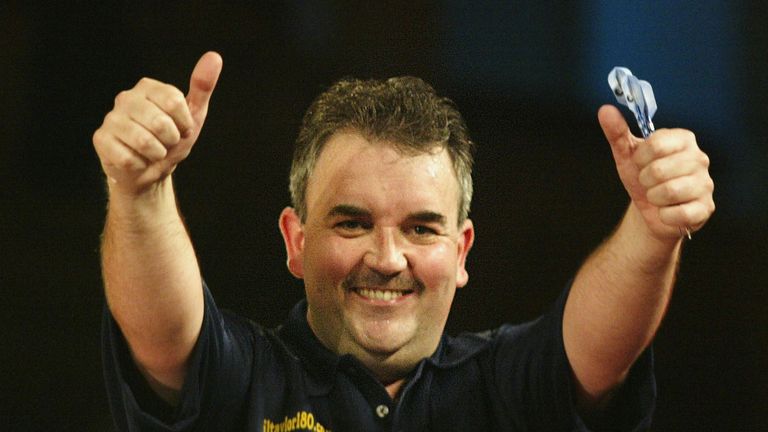 Phil Taylor of England celebrates winning his match against Kevin Painter of England at the World Matchplay