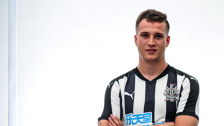 Javier Manquillo poses during a photocall at his unveiling as a Newcastle United player