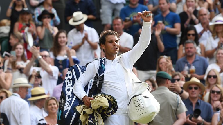 Spain's Rafael Nadal waves as he leaves the court after beating Russia's Karen Khachanov during their men's singles third round match on the fifth day of t