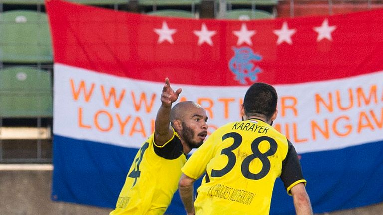 Progres Niederkorn's Emmanuel Francoise (L) celebrates his goal to make it 1-0.