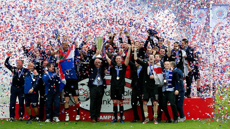 Rangers celebrate with the SPL trophy in 2011