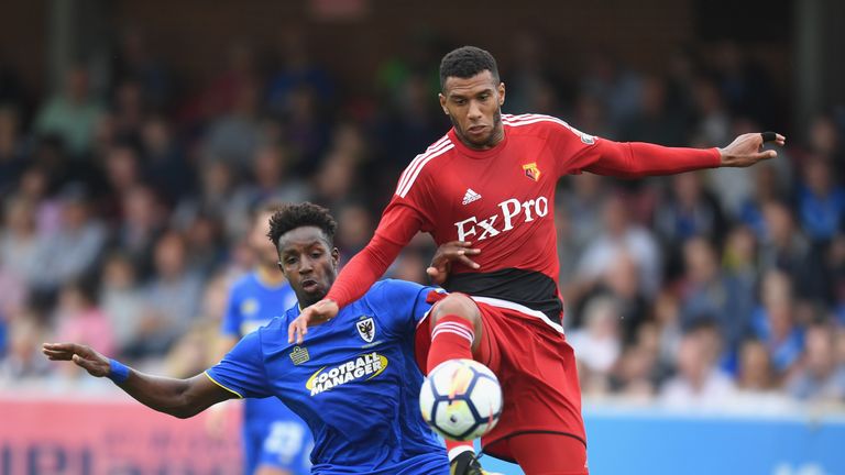 Raoul Esseboom of Wimbledon battles Etienne Capoue of Watford during a pre-season friendly