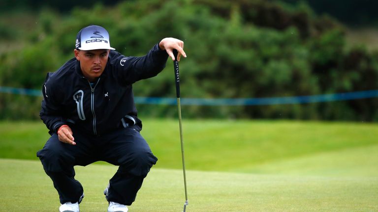 Rickie Fowler lines up a putt during the third round of the Scottish Open