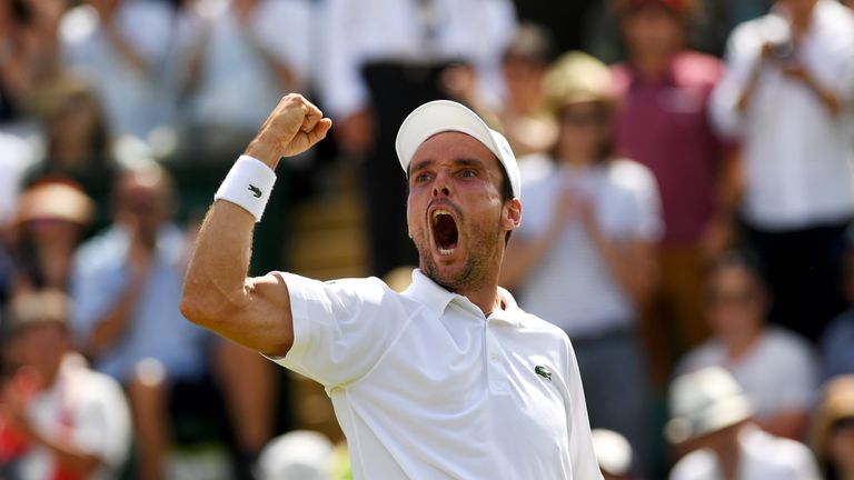 LONDON, ENGLAND - JULY 07:  Roberto Bautista Agut of Spain celebrates victory during the Gentlemen's Singles third round match against Kei Nishikori of Jap