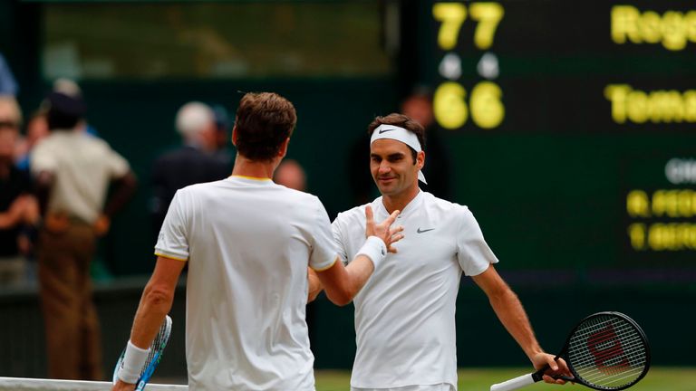 Federer (R) beat Tomas Berdych in straight sets