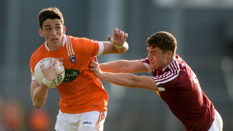 Rory Grugan of Armagh in action against Kelvin Reilly of Westmeath during the GAA Football All-Ireland Senior Championship Round 2B match