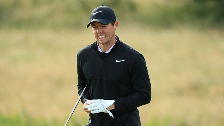 TROON, SCOTLAND - JULY 13:  Rory McIlroy of Northern Ireland reacts on the 11th green during day one of the AAM Scottish Open at Dundonald Links Golf Cours